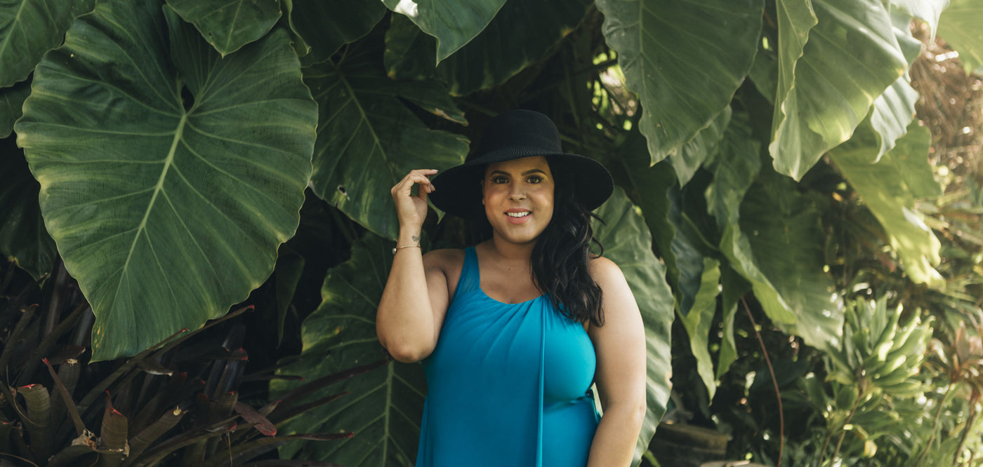 Woman wearing a plus size tankini swim suit